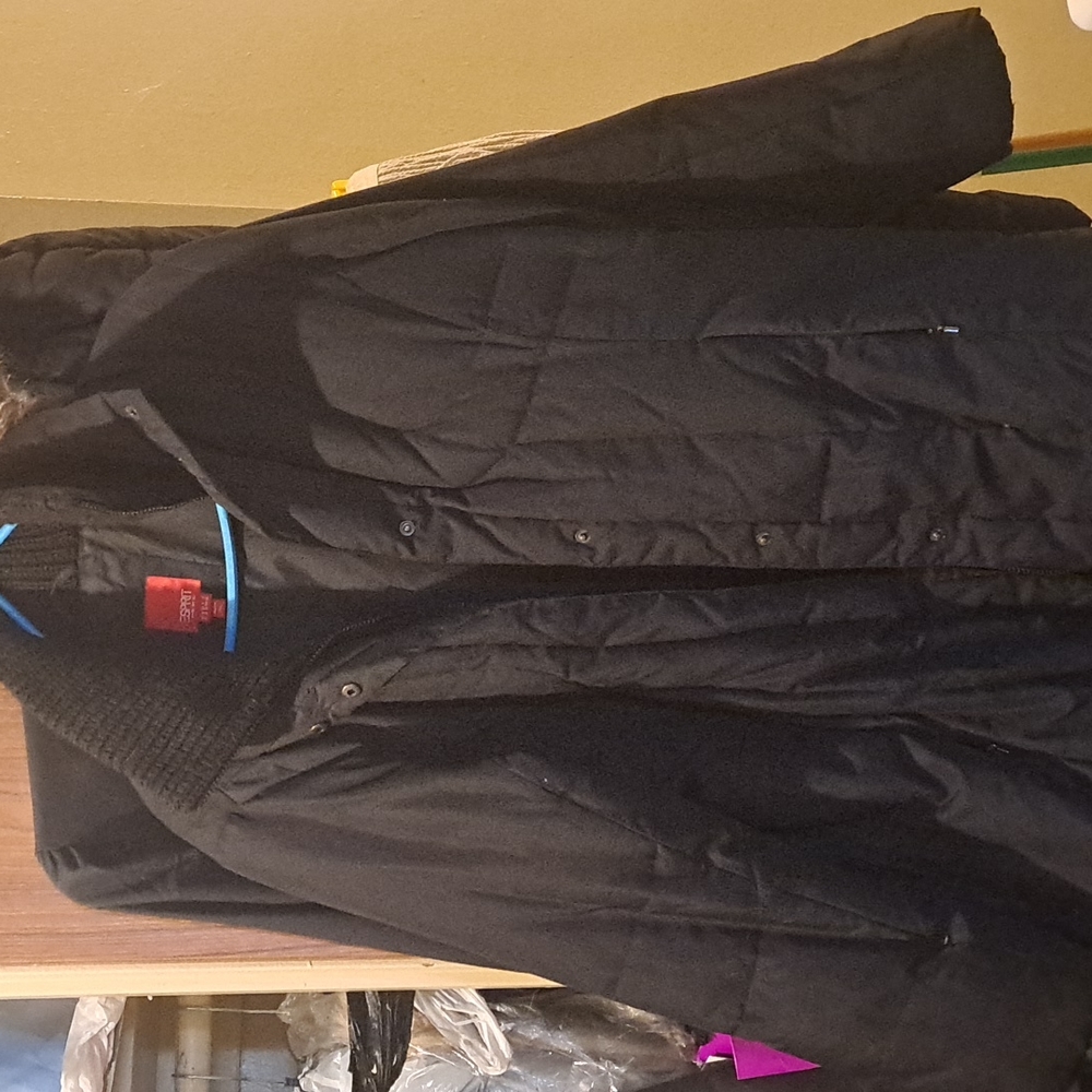 Used black long quilted coat